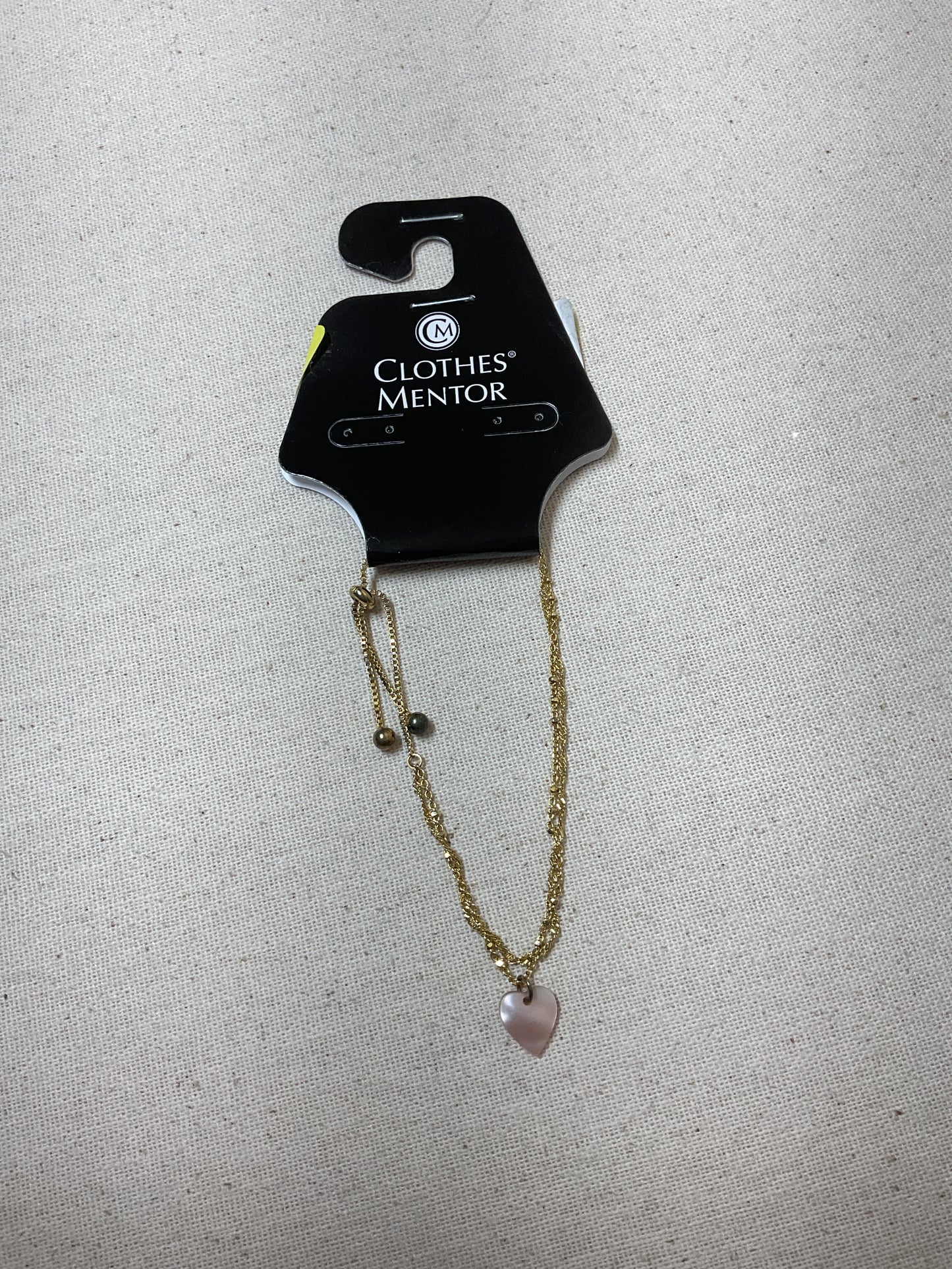 Bracelet Charm By Clothes Mentor In Gold & Pink